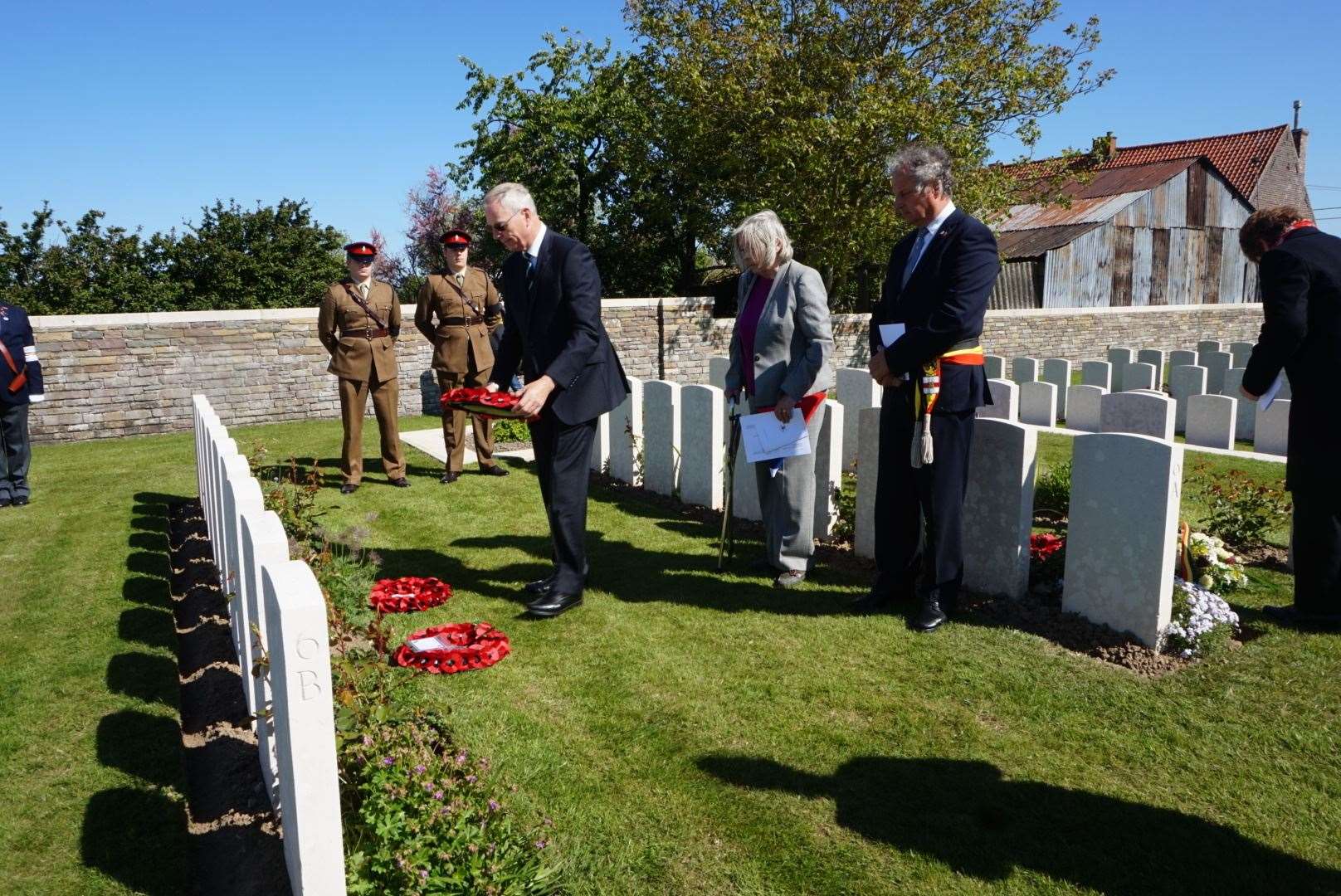 Geoffrey Tuff lays a wreath at the graveside of his great uncle Capt Tuff at Oosttaverne Wood Cemetery (10379453)