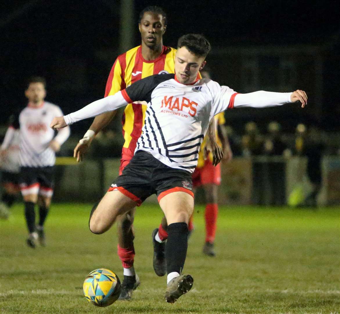Deal midfielder Wes Hennessey strikes towards goal against Fisher. Picture: Paul Willmott