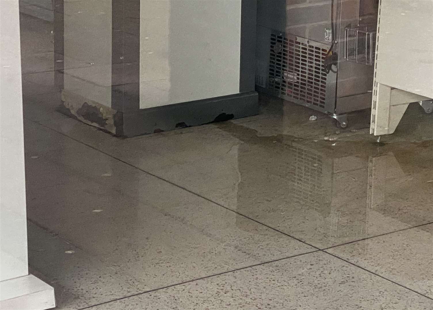 The water appears to be coming from a pillar inside the former Wilko