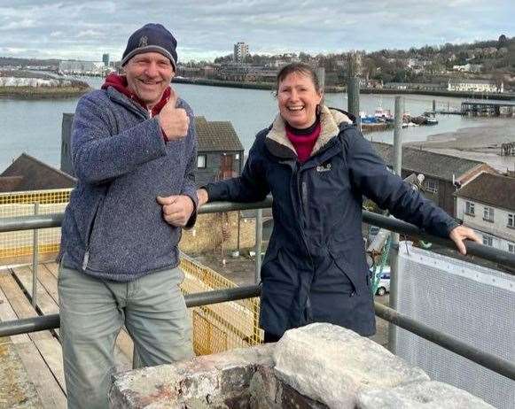 Sheila Featherstone and roofer Chris Griffin admiring the building's new chimney. Photo: Sheila Featherstone