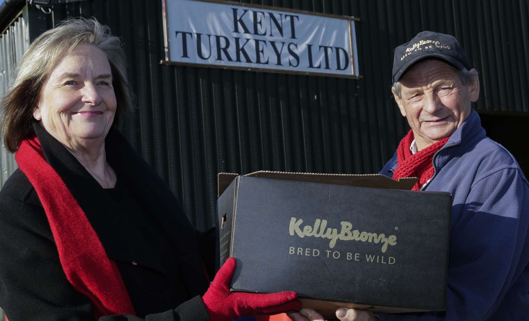 Angela Clay in 2016, collecting a turkey from Woolpack Corner Farm in Biddenden, to feed the homeless at Christmas Pic: Martin Apps