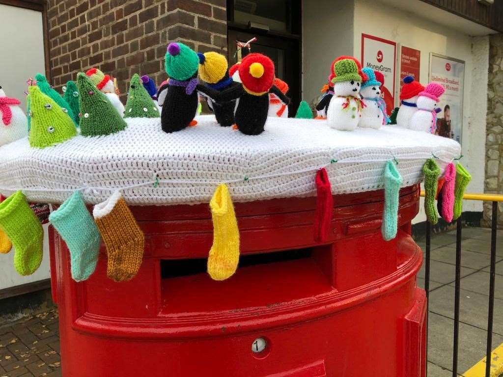 Snowmen and penguins on the postbox in East Street
