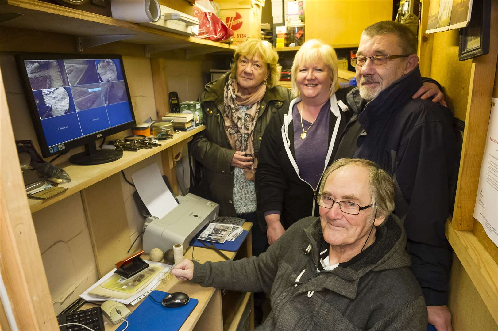 Roger Betts, centre, with volunteers from the Friends of the Minster Abbey Gatehouse Museum Picture: Andy Payton