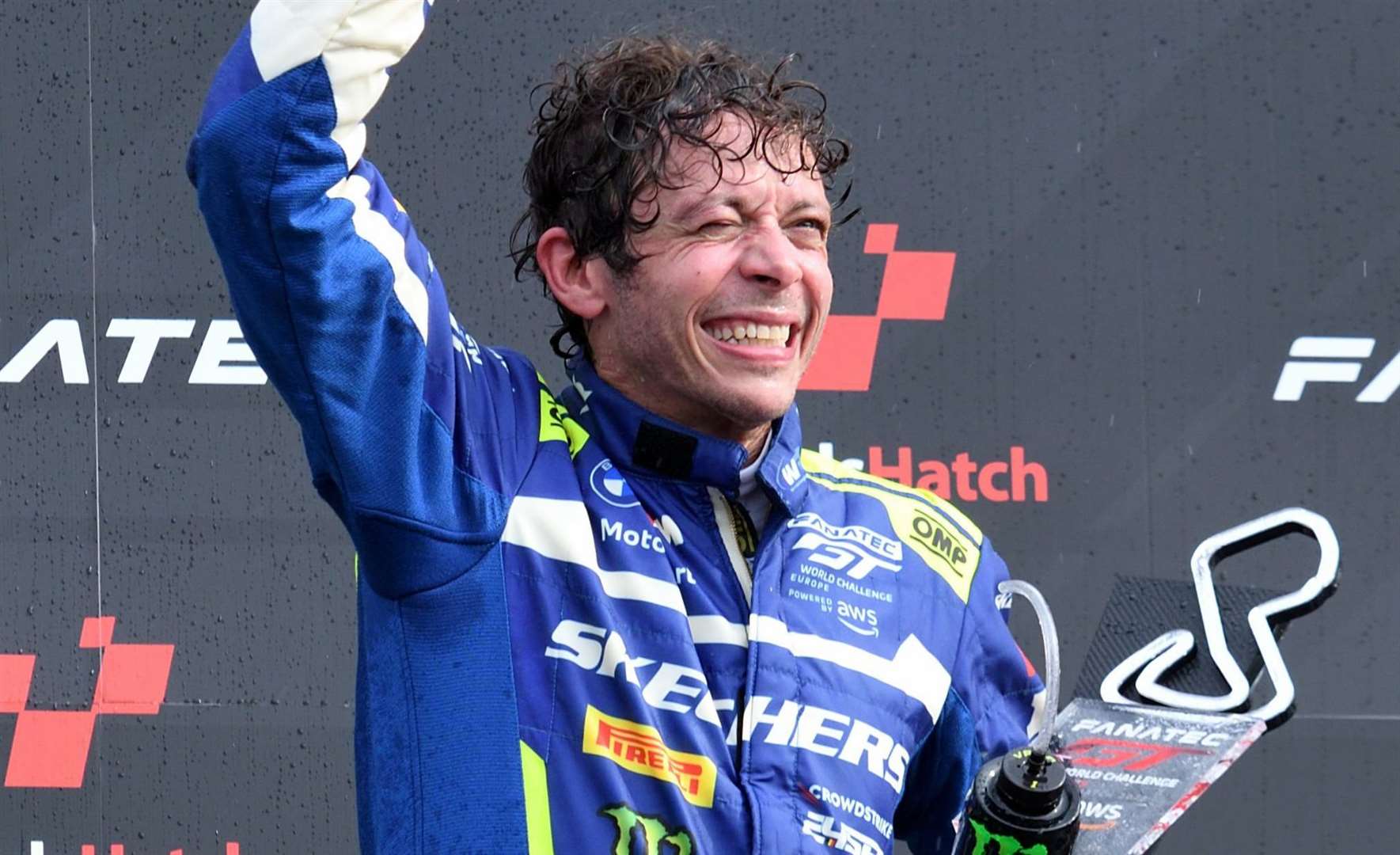 Rossi celebrates his podium finish on the Brands Hatch podium. Picture: Simon Hildrew