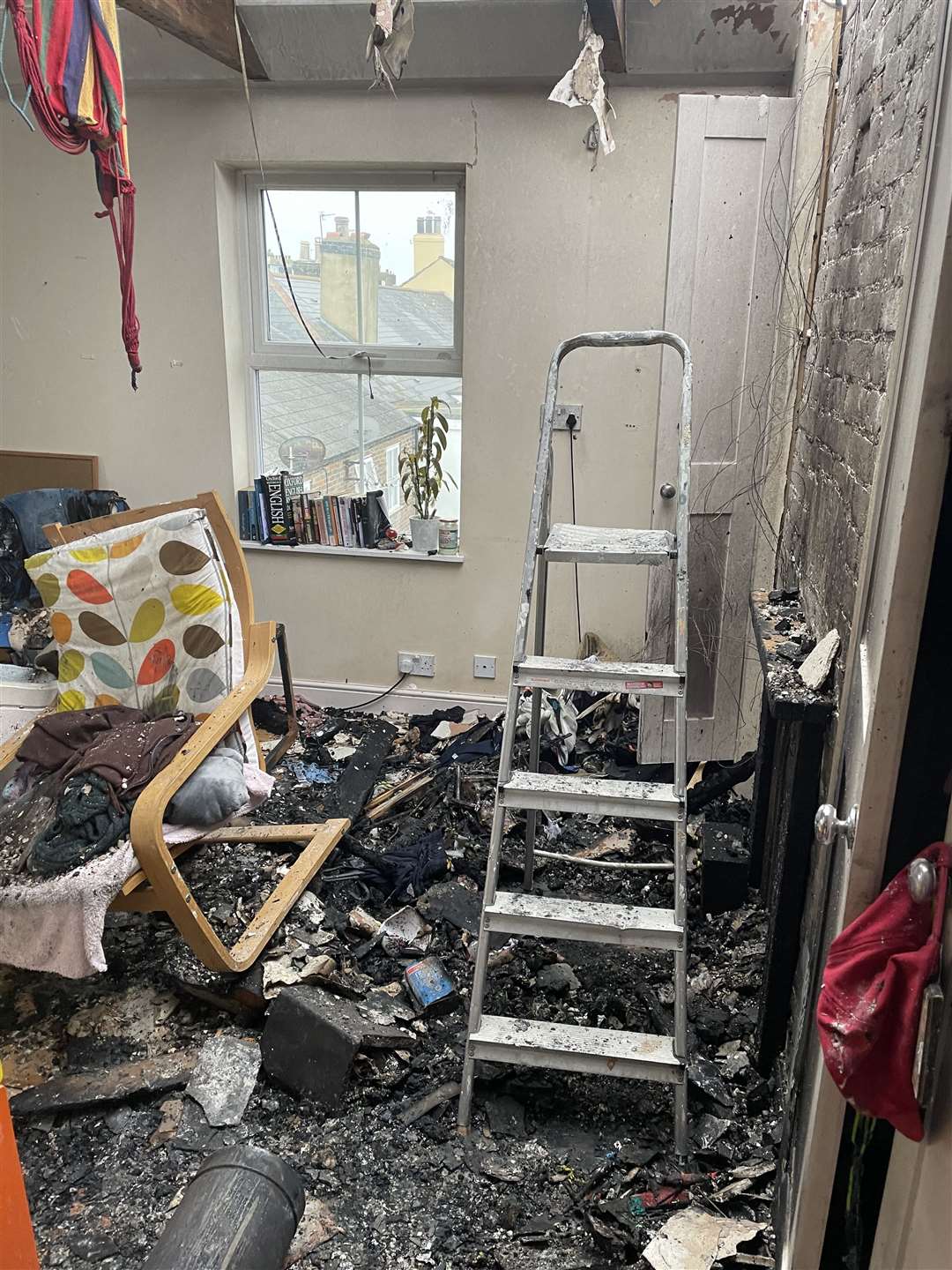 One of the rooms strewn with debris after the fire. Picture from Zoey Cross