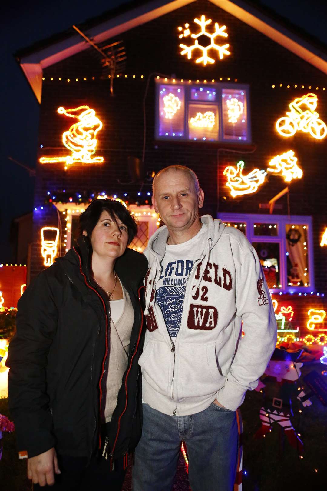 Becky Loftus and her partner Dean have again decked their home in Christmas lights and are collecting money for Pilgrims Hospices
