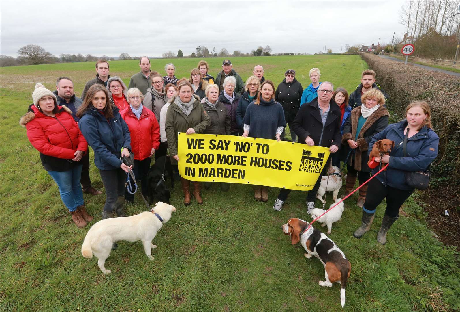 Claudine Russell, chair of Marden Planning Opposition, with supporters on the land proposed for 2,000 homes