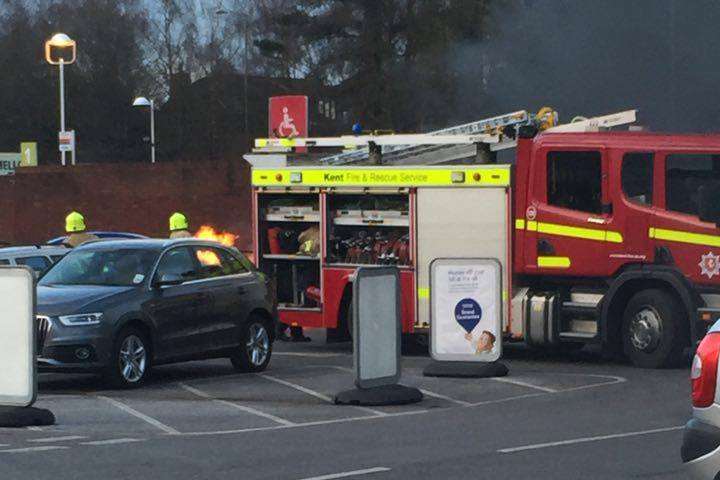 Firefighters tackle the blaze at Tesco Crooksfoot store in Ashford. Pic by Jessica Davies