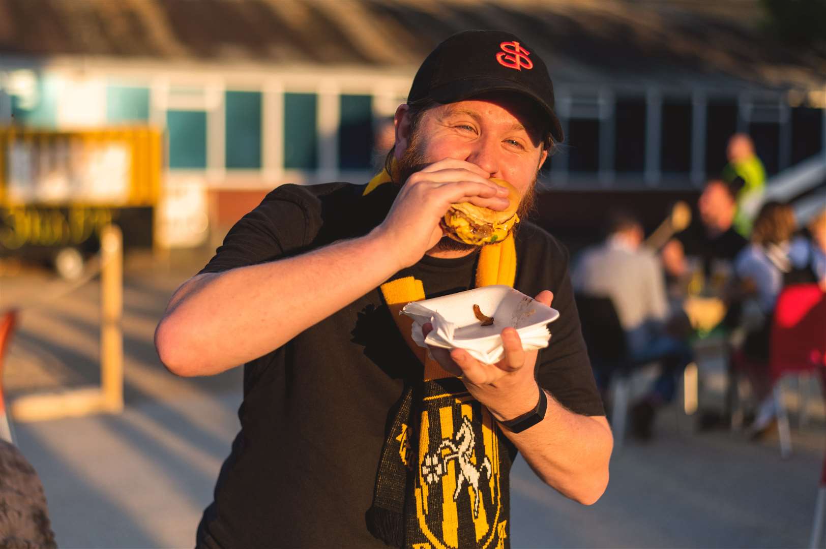 Reporter Rhys Griffiths enjoys his pre-match cheeseburger. Picture: Ben O'Reilly