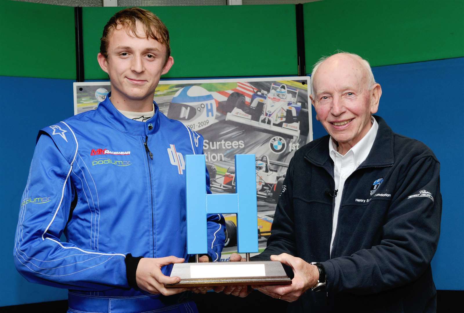 Sportscar racer David Pittard received a Henry ‘H’ trophy after winning the 2013 Henry Surtees Challenge. Picture: Simon Hildrew