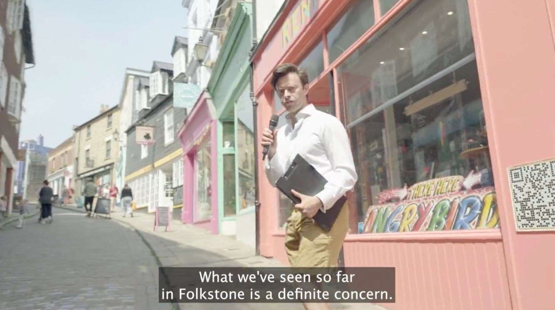 A still from a Twitter video of actor Jolyon Rubinstein speaking to people in Folkestone about immigration for spoof news segment. Picture: Jolyon Rubinstein