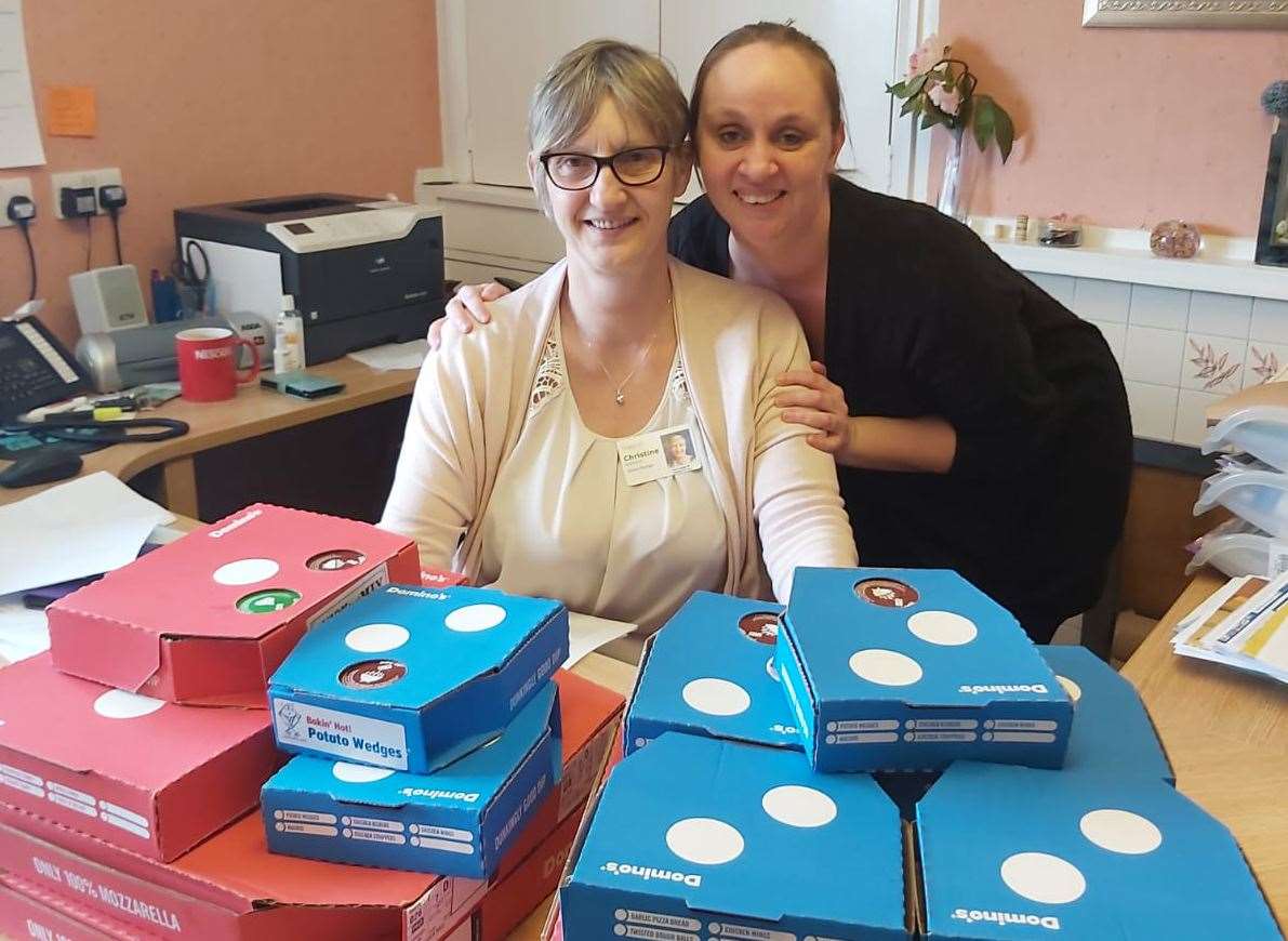 General manager of Dene Holm care home, Christine Hutchinson and carer, Nicola Williams with their pizza, kindly donated by the mysterious Tara