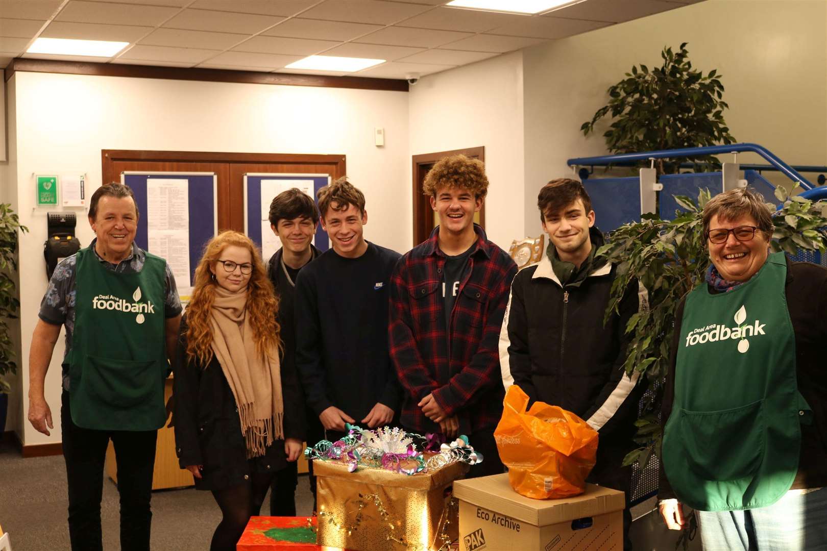 Sixth formers with their collectiojn, seen with members of Deal Area Foodbank. Picture: Sandwich Technology School