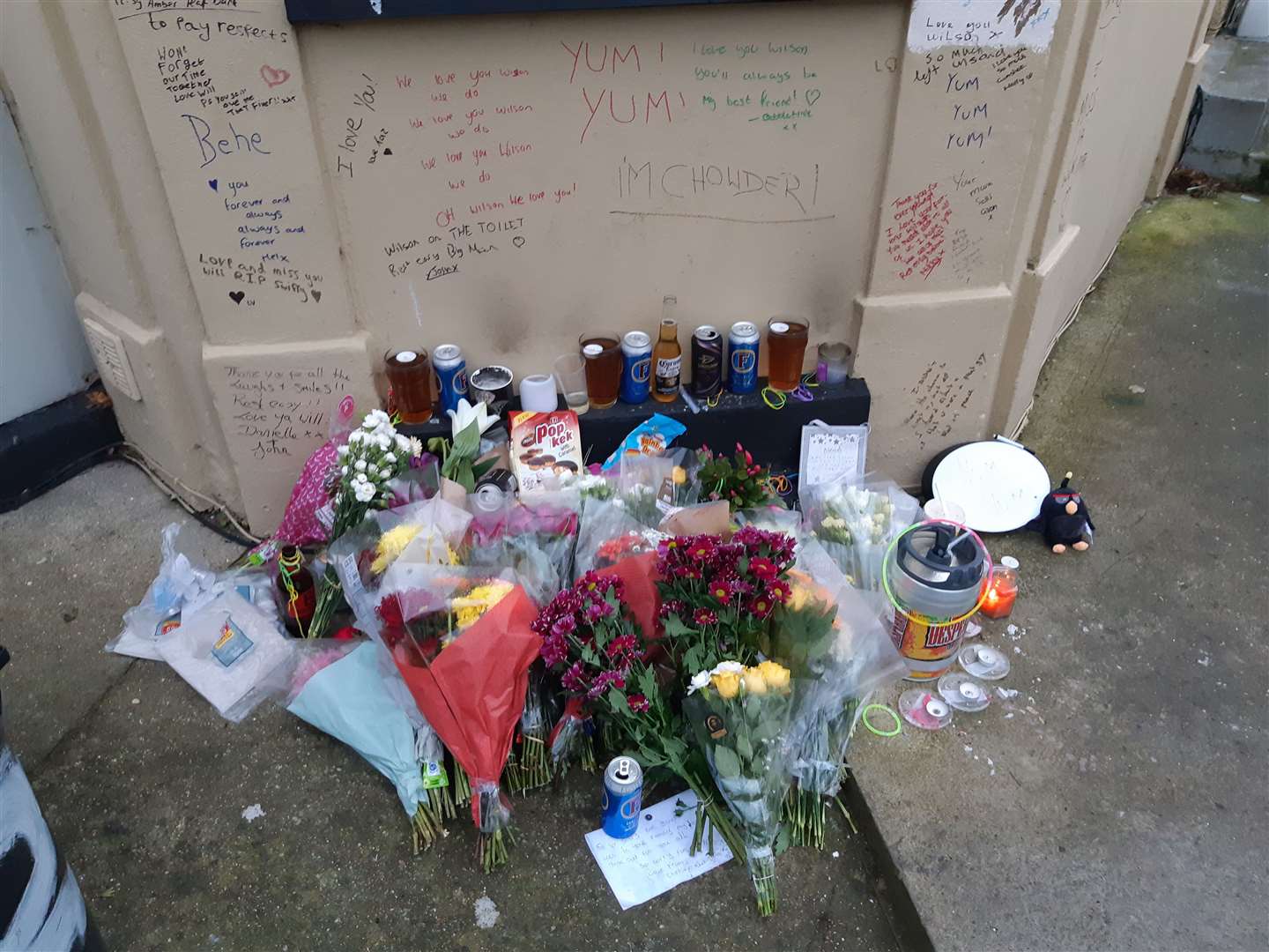 The tributes for William Wilson outside his home just after his death
