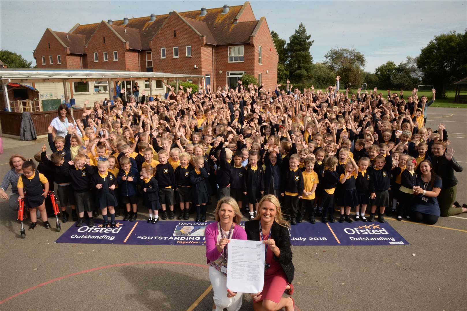 Reculver Primary School deputy head Stella Collins and head Jenny Ashley-Jones in front of the pupils