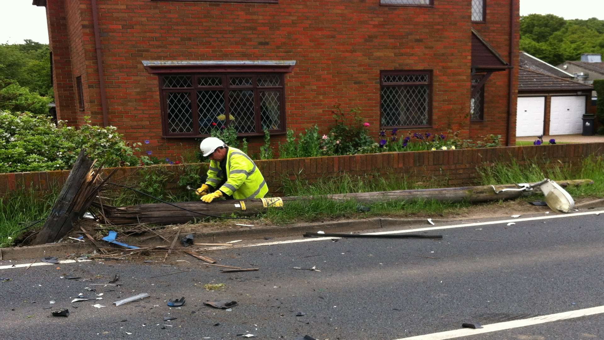 A telegraph pole was ripped from the ground