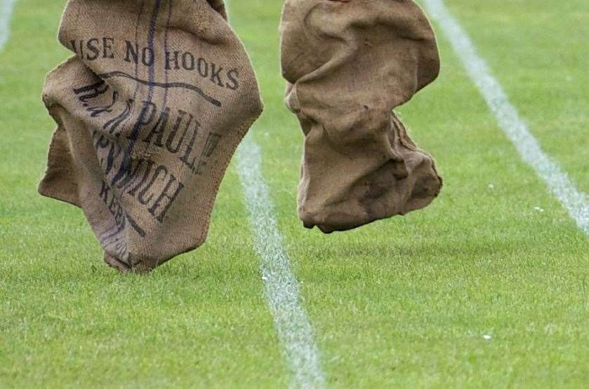 The sergeants engaged in a sack race. Stock picture