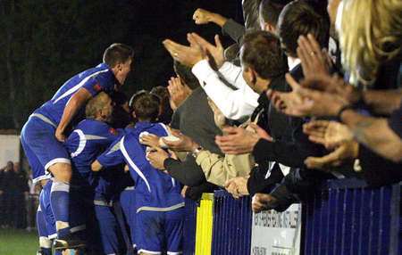 Tonbridge Angels players and supporters celebrate the winning goal against Harrow