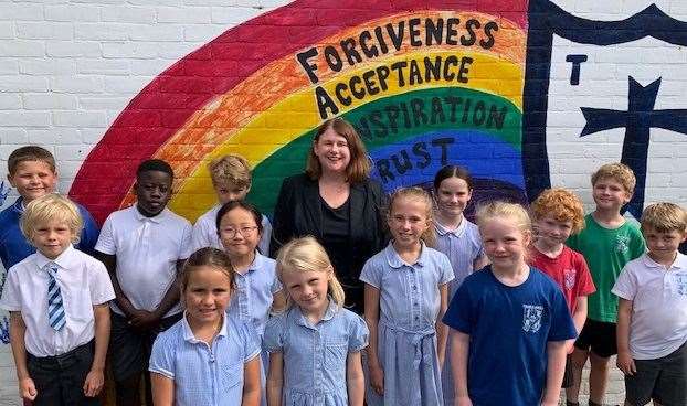 Head teacher Angela Matthews and pupils celebrate the school’s rating in the new Ofsted report. Picture: Temple Ewell