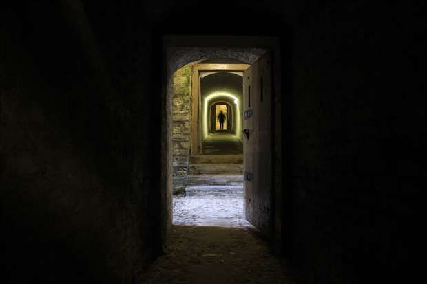 Dover Castle's medieval tunnels can feel unnerving if down there alone. Pic: Joe Wright