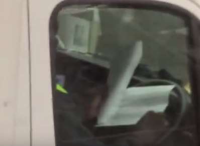 One driver was caught reading papers at the wheel