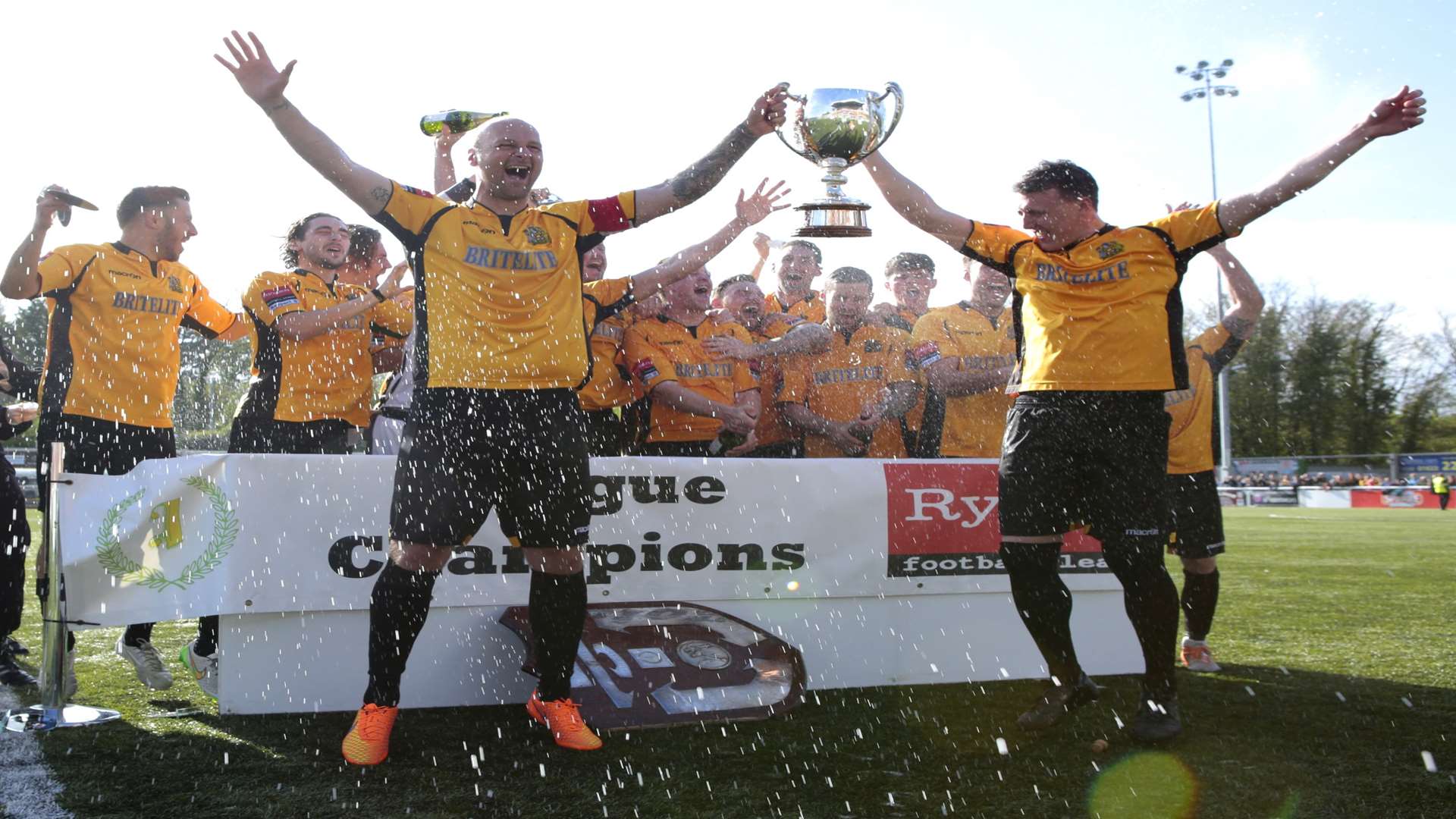 Steve Watt and Alex Flisher lift the Ryman Premier trophy together at Maidstone Picture: Martin Apps