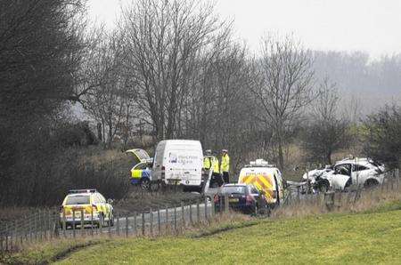 Police at the scene of the crash on the A20