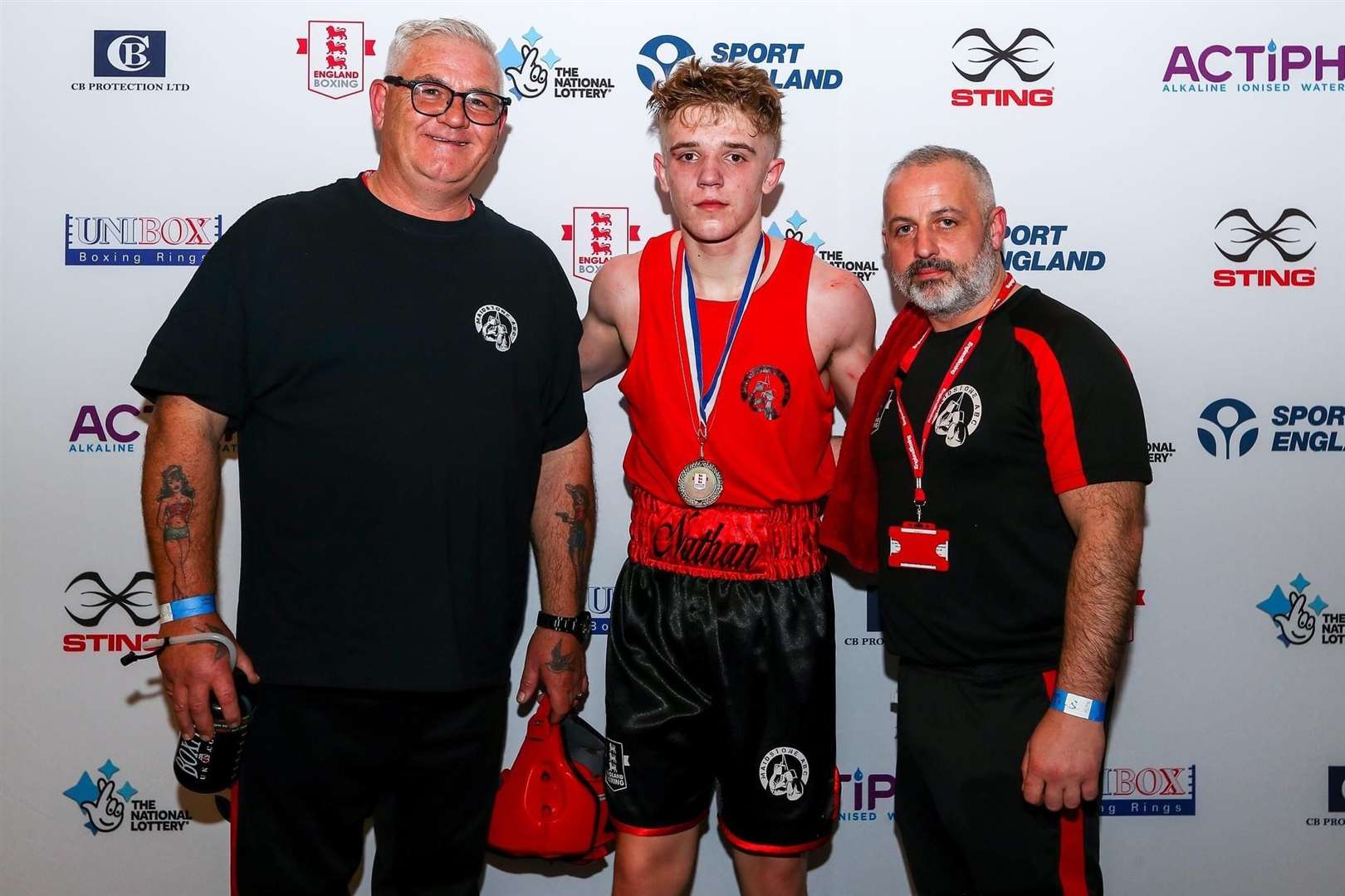 Maidstone ABC boxer Nathan Williams with coaches John Adams, left, and Joe Smith. Picture: England Boxing
