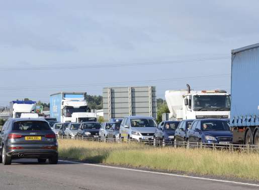 Traffic is nose to tail after the lorry broke down. Picture: Barry Hollis