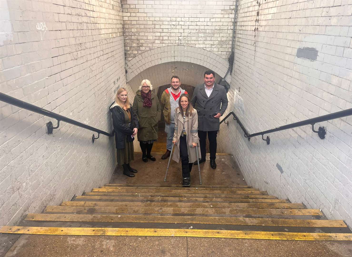 Faversham MP Helen Whatley with town representatives in the station underpass