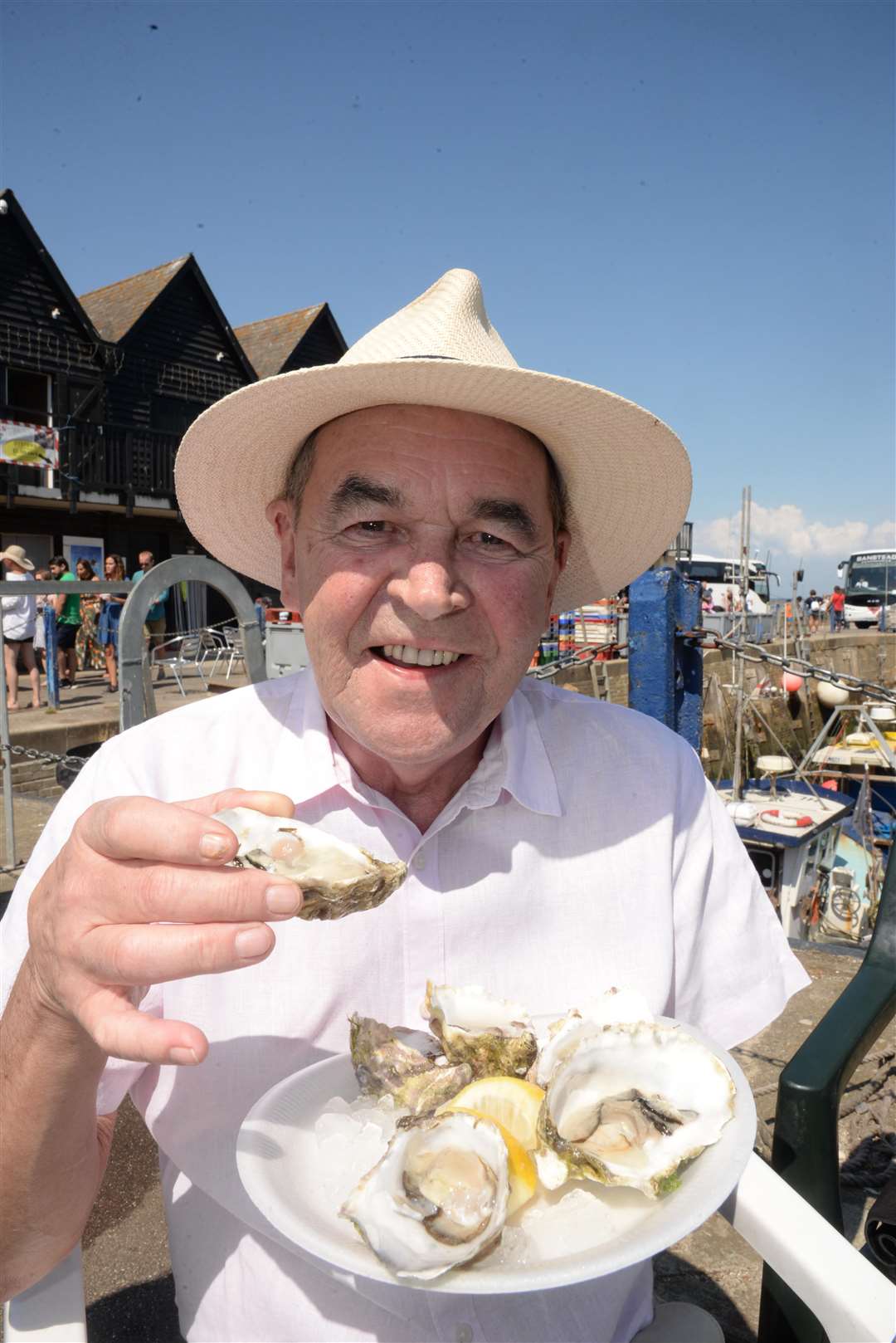 Jim Warrilow enjoys the oysters at the Whitstable Oyster Festival on Saturday. Picture: Chris Davey... (3192380)