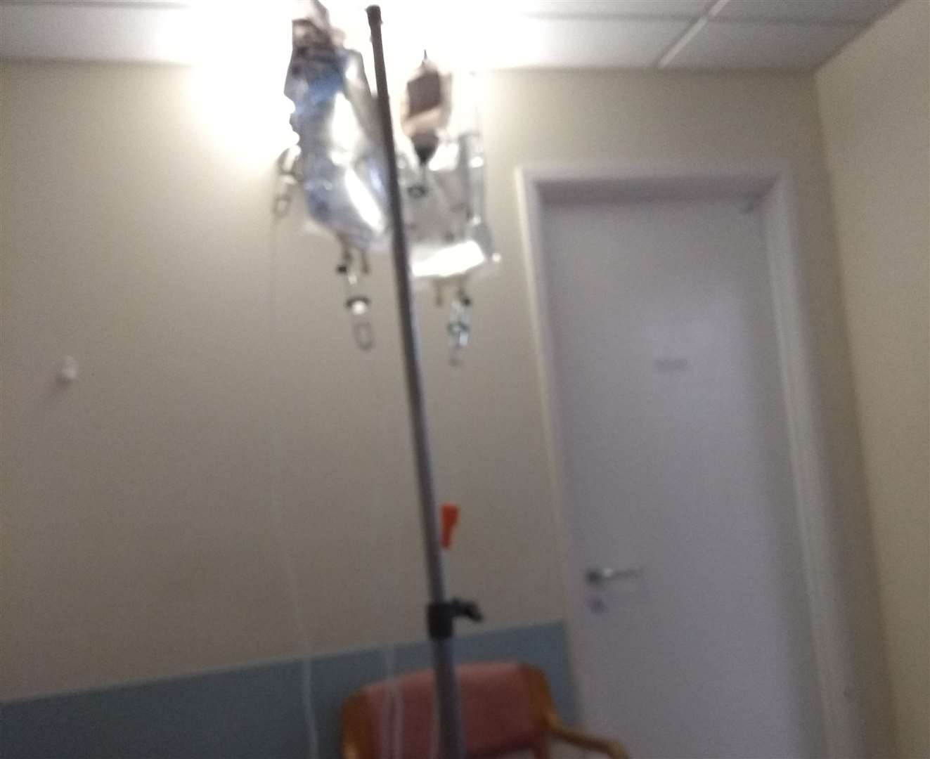 The patient took this picture of a drip stand being used by herself and two others at the hospital