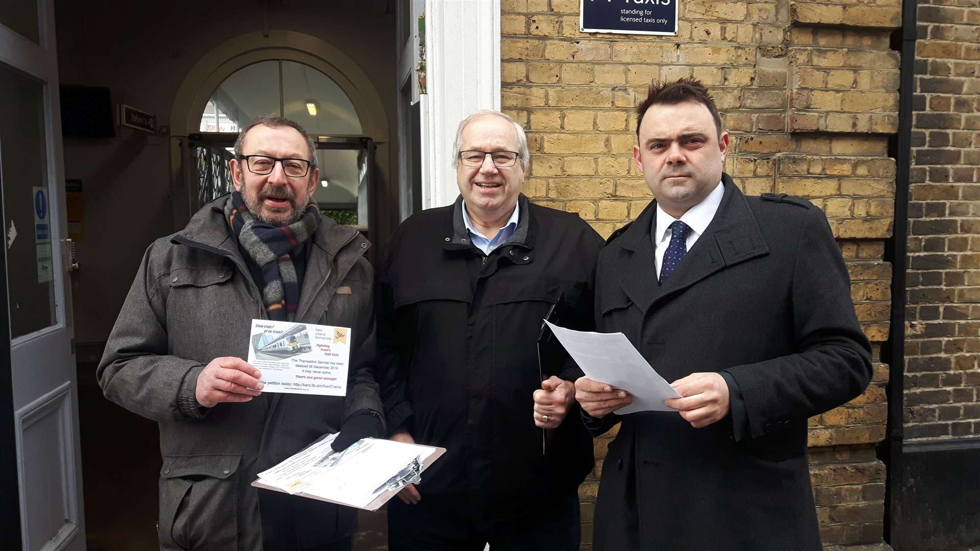 James Willis (right) campaigning for better rail services outside Maidstone West station in March this year, with Lib Dem KCC councillors Rob Bird (left) and Ian Chittenden
