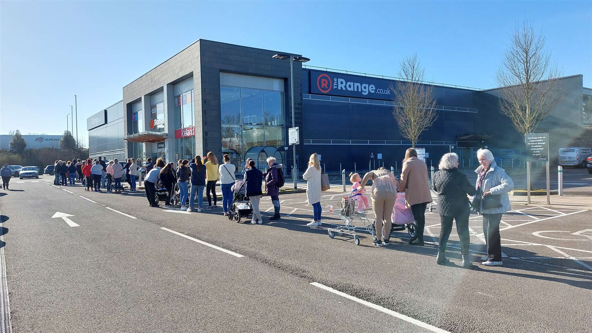 A long queue of shoppers before the store opened at 9am