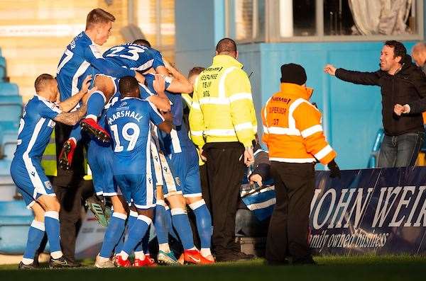 Gillingham celebrate Connor Ogilvie's goal late on Picture: Ady Kerry (25432944)