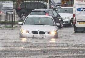 A car was stranded at the bottom of Millen Road. Picture: Adam Yates from November 3