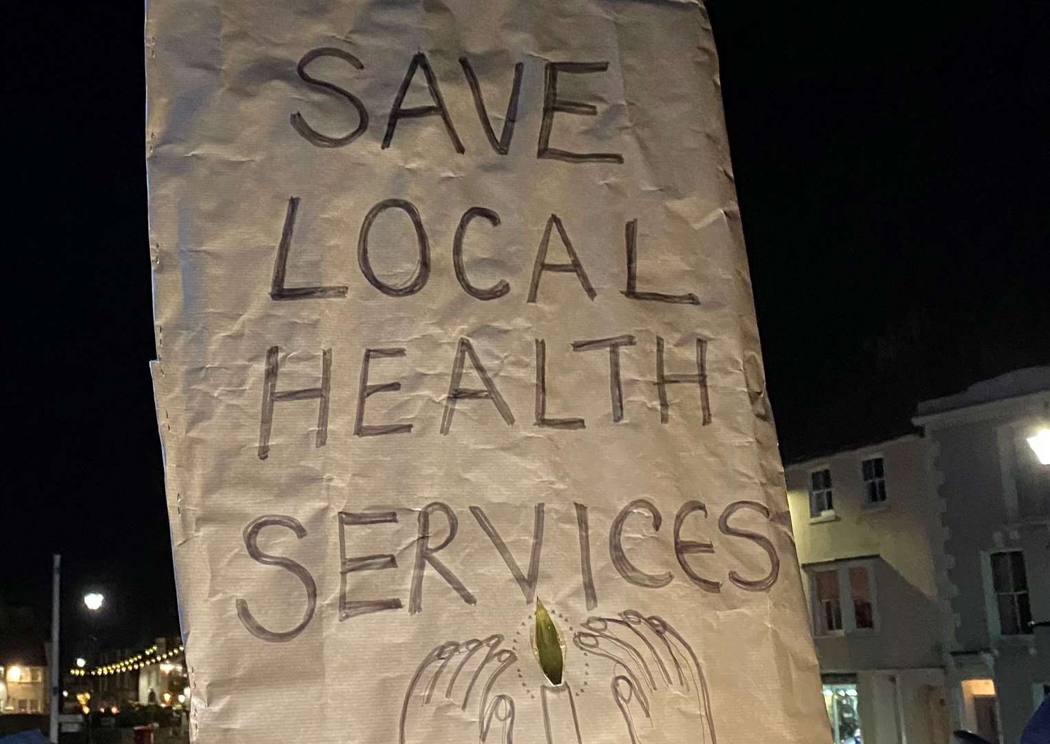 One of the banners at the vigil