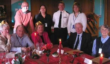 Tony Menpes and Joyce Winning, both pictured right, with some of their colleagues and Ch Supt Alasdair Hope