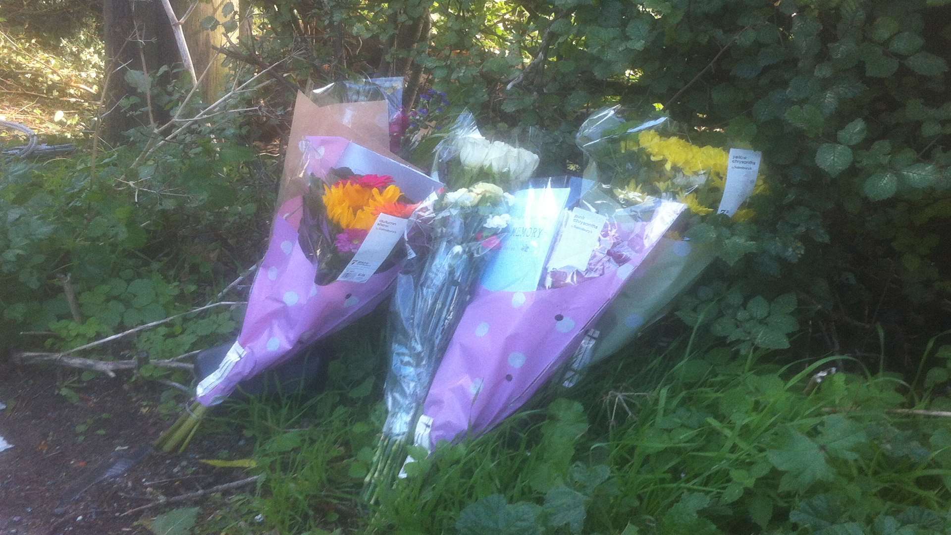 Flowers left at the scene on the Canterbury-bound side of the road