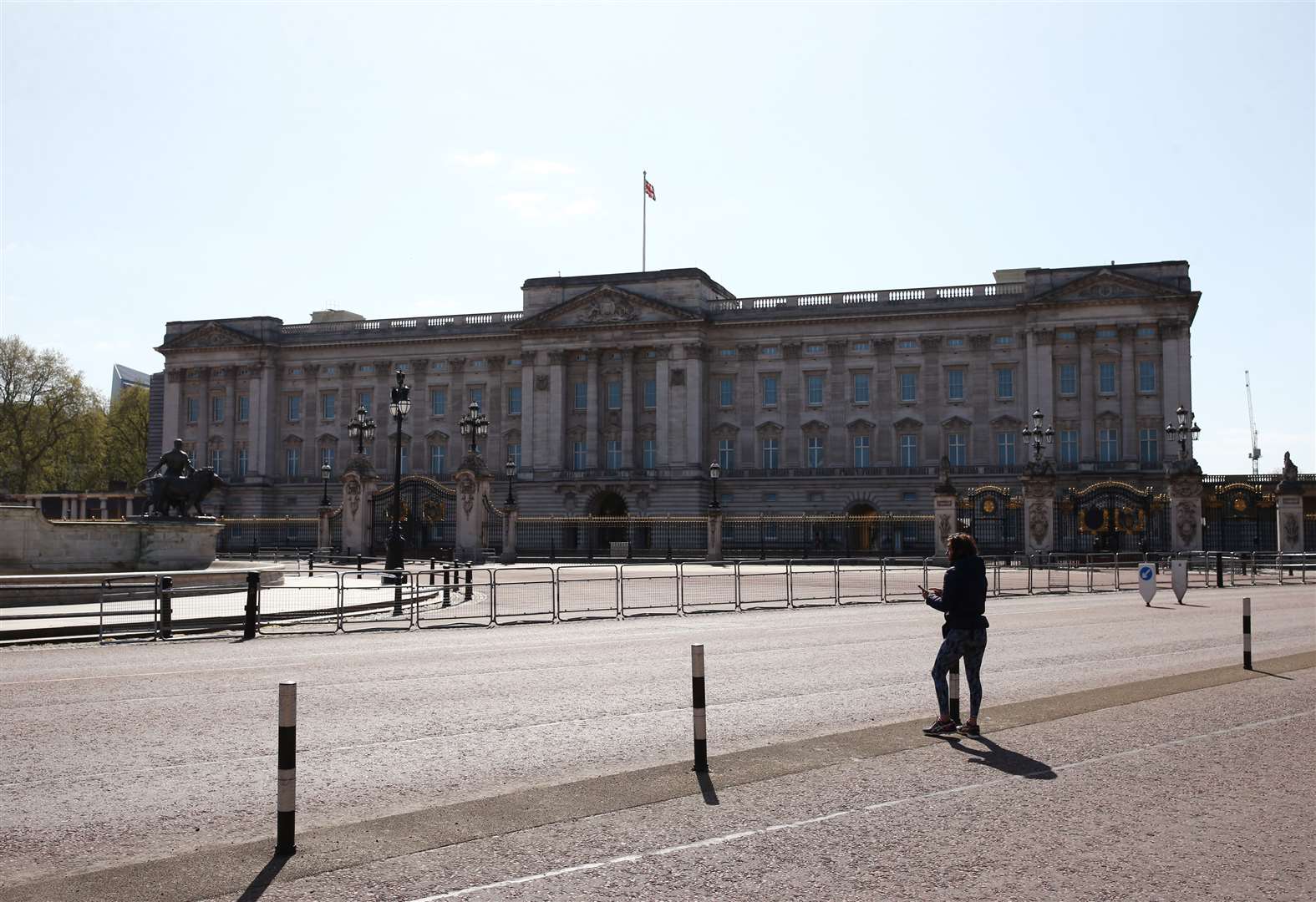 Barriers prevent members of the public being able to walk up to the front gates of Buckingham Palace (Yui Mok/PA)