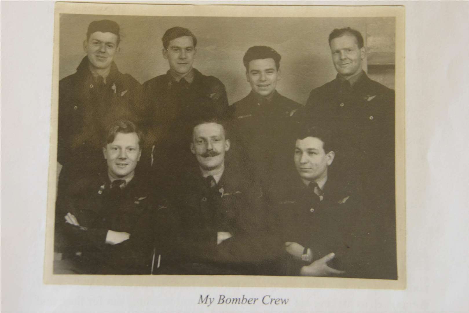 Tenterden.War Hero Colin Deverell top left with his crew in 1943.Picture: Paul Amos. (4254563)