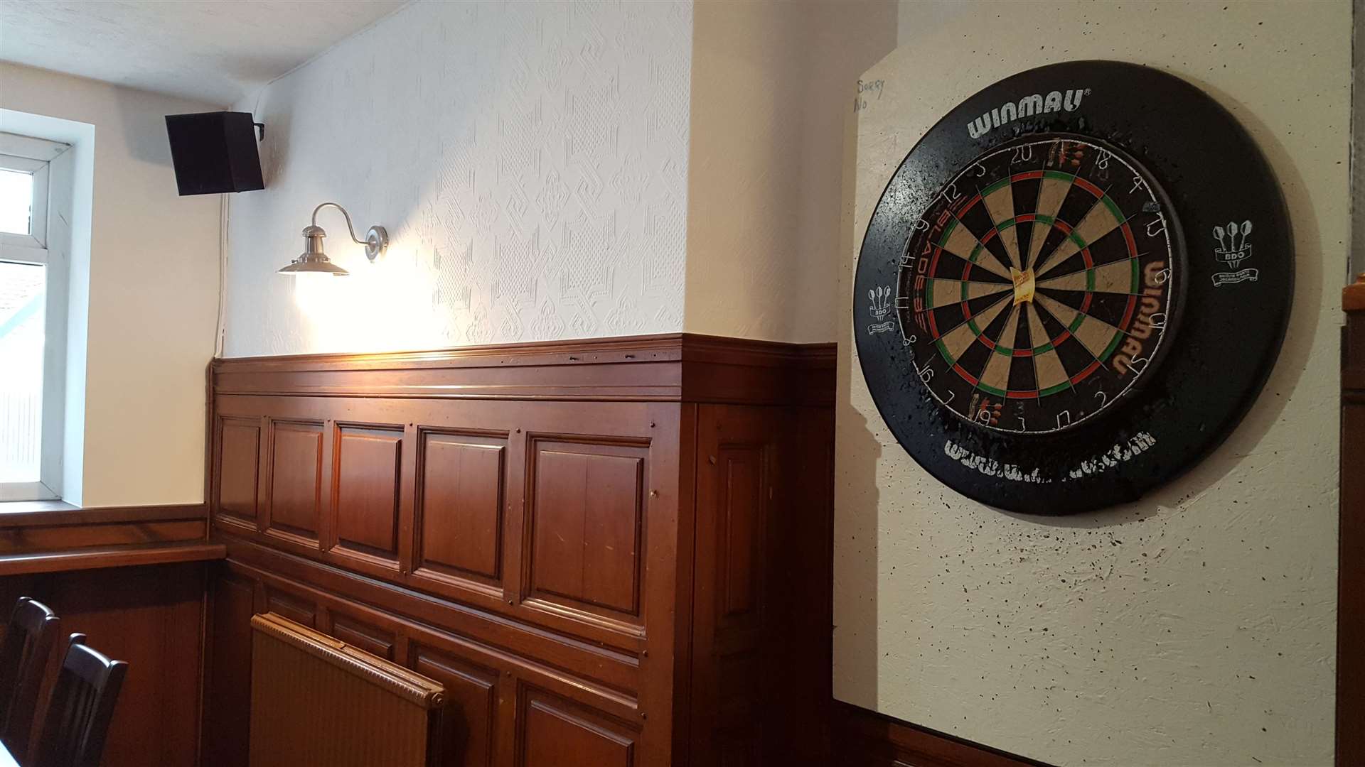 The "traditional" pub has a darts board and a jukebox