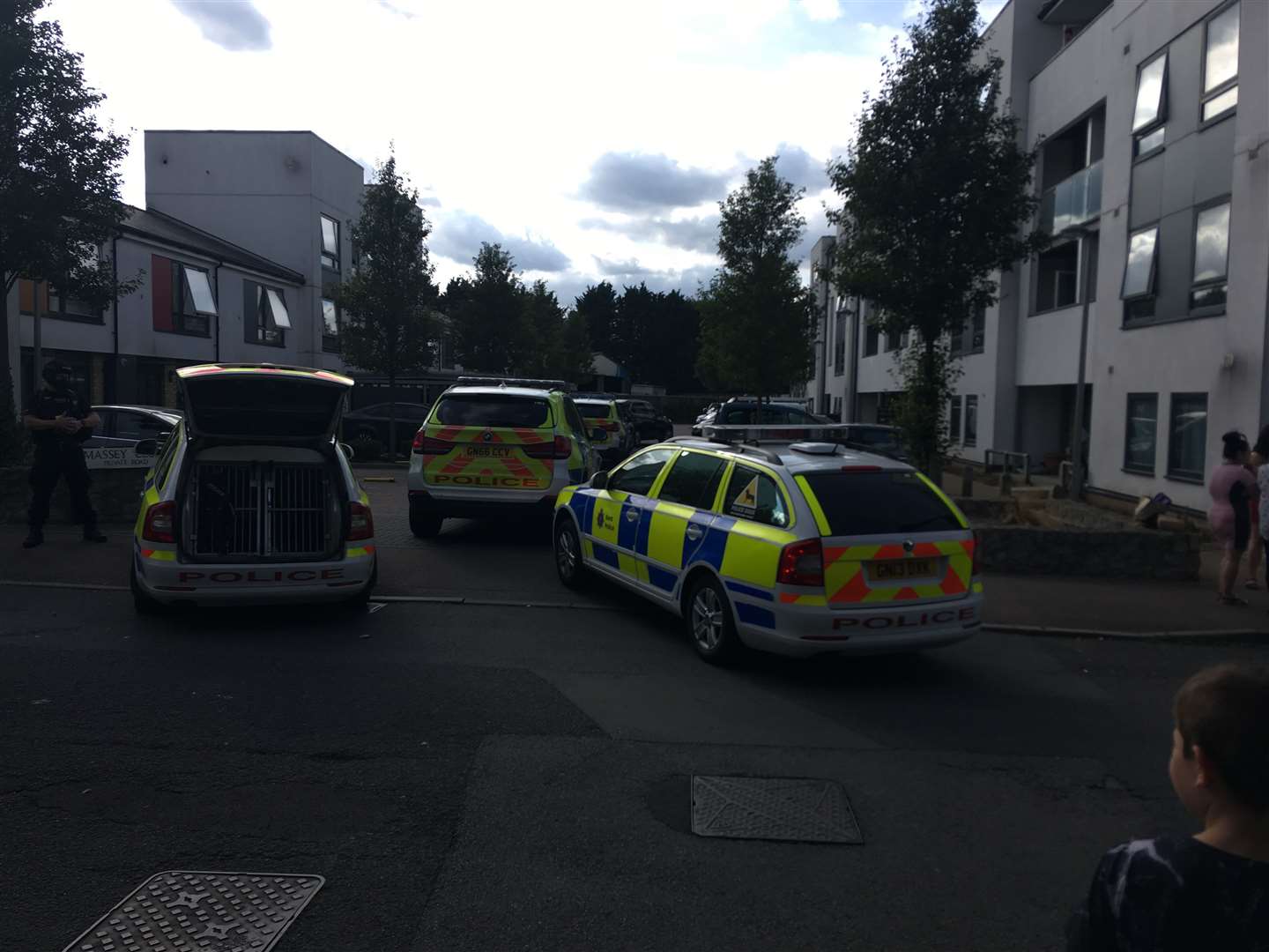 Armed police are at Massey Close