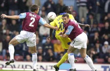 IN DIFFERENT LEAGUES NOW: Action from Gills' game against West Ham last season at Upton Park. Picture: GRANT FALVEY