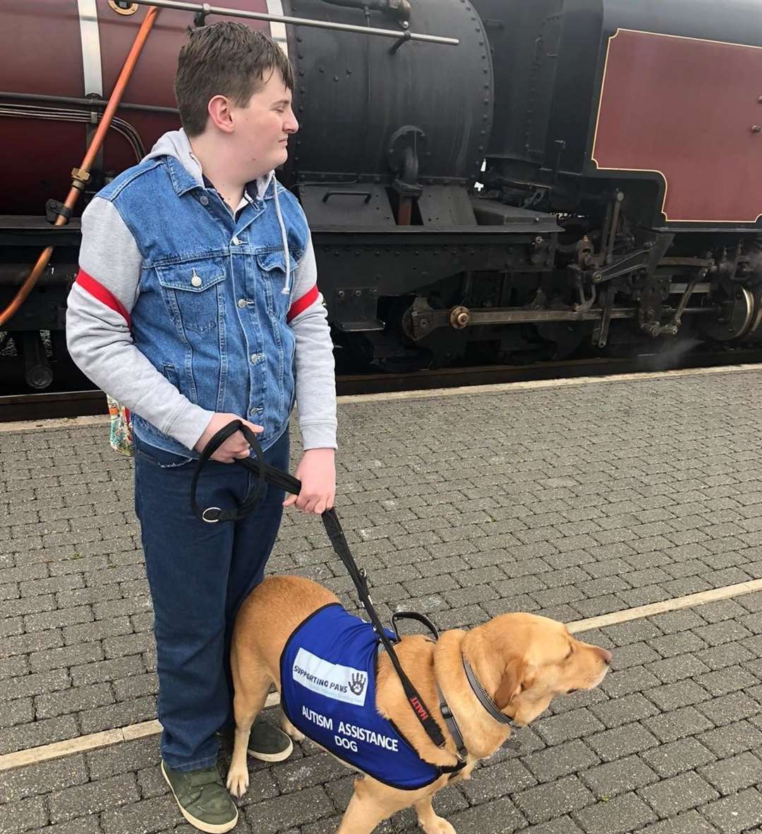 Benedict with his assistance dog, Daisy