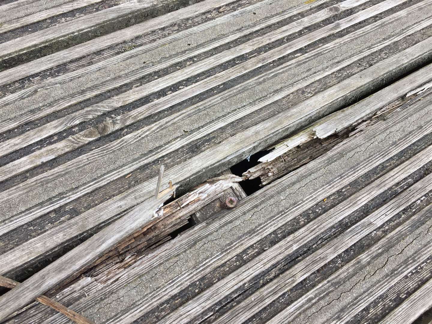 Splinters stick out of the decking at the block of flats in St Andrew's Close in Whitstable