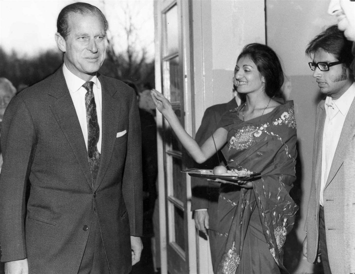 Madhvi Pattni showered the Duke of Edinburgh with rose petals and rice in a traditional Indian welcome to the Uganda Resettlement Centre in West Malling in November 1972. Mrs Pattni was one of the Asians expelled from Uganda by President Idi Amin