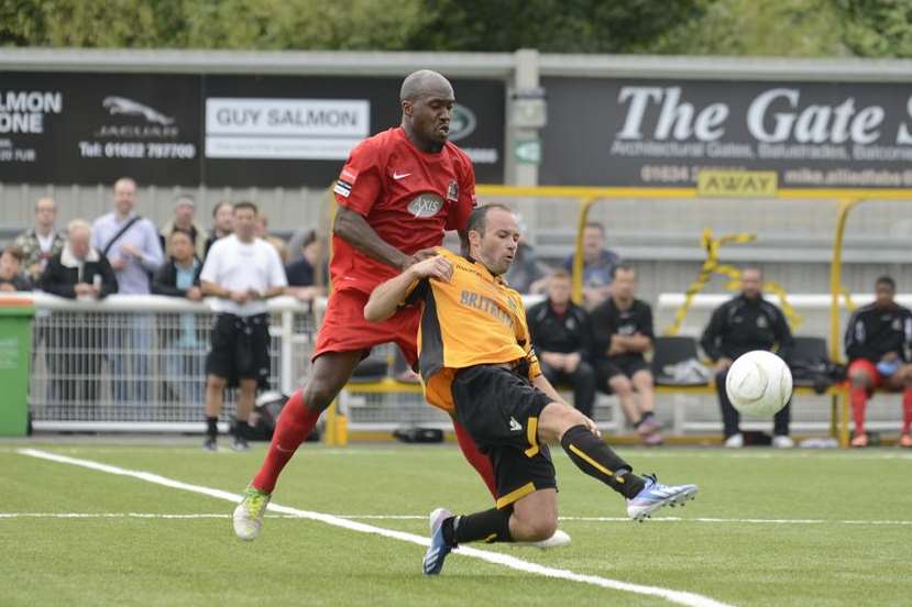 Michael Phillips shows the commitment that made him a crowd favourite at Maidstone Picture: Martin Apps