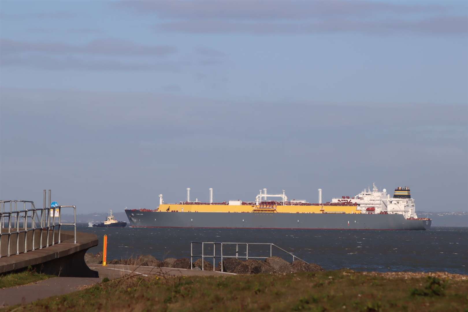 The 294m 103,885-tonne liquefied natural gas tanker Yari passes Sheerness on Monday morning assisted by four tugs. Picture: John Nurden
