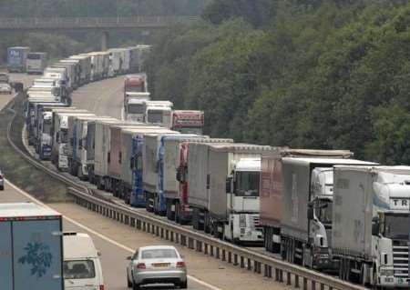 Lorries queueing on the M20 at the approach to junction 9 (Ashford). Pictures: Gary Browne